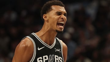 DALLAS, TEXAS - OCTOBER 22: Victor Wembanyama #1 of the San Antonio Spurs reacts to a score during the first half against the Dallas Mavericks at American Airlines Center on October 22, 2025 in Dallas, Texas. NOTE TO USER: User expressly acknowledges and agrees that, by downloading and or using this photograph, User is consenting to the terms and conditions of the Getty Images License Agreement. Stacy Revere/Getty Images/AFP (Photo by Stacy Revere / GETTY IMAGES NORTH AMERICA / Getty Images via AFP)