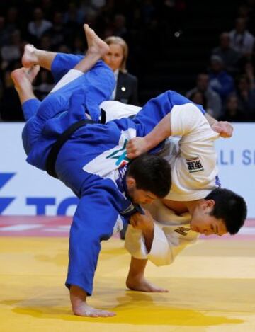 Kentaro Lida de Japón y Cyrille Maret de Francia.