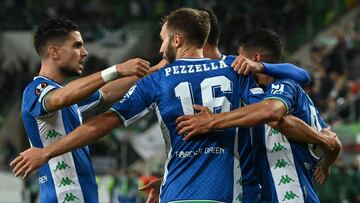 Real Betis' players celebrate leading 2:1 after Ferencvaros' US defender Henry Wingo (unseen) scored an own goal during the UEFA Europa League Group G football match between Ferencvaros and Real Betis in Budapest, Hungary, on September 30, 2021.