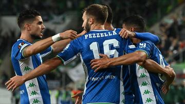 Real Betis&#039; players celebrate leading 2:1 after Ferencvaros&#039; US defender Henry Wingo (unseen) scored an own goal during the UEFA Europa League Group G football match between Ferencvaros and Real Betis in Budapest, Hungary, on September 30, 2021.
