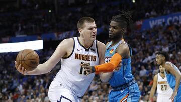 Mar 29, 2019; Oklahoma City, OK, USA; Denver Nuggets center Nikola Jokic (15) drives to the basket as Oklahoma City Thunder forward Nerlens Noel (3) defends during the first quarter at Chesapeake Energy Arena. Mandatory Credit: Alonzo Adams-USA TODAY Sports