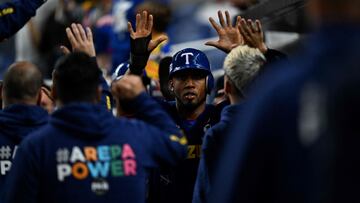 Venezuela's Leonardo Reginatto celebrates scoring a run during the Caribbean Series baseball game between Nicaragua and Venezuela at LoanDepot Park in Miami, Florida, on February 7, 2024. (Photo by Chandan Khanna / AFP)