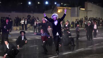 Ultra-Ortodox Jewish men protest against attempts to change government policy that grants ultra-Orthodox Jews exemptions from military conscription in Jerusalem February 26, 2024. REUTERS/Ronen Zvulun