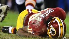 Robert Griffin III, en una de sus lesiones en la NFL.