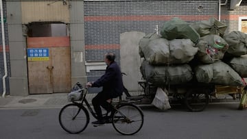 Problemas en China: necesita basura y la gente hace locuras para conseguirla