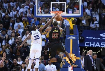 Kevin Durant of the Golden State Warriors blocks the shot of LeBron James of the Cleveland Cavaliers
