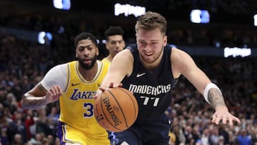 Nov 1, 2019; Dallas, TX, USA; Dallas Mavericks guard Luka Doncic (77) grabs the ball away from Los Angeles Lakers forward Anthony Davis (3) during the fourth quarter at American Airlines Center. Mandatory Credit: Kevin Jairaj-USA TODAY Sports