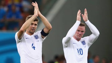 MANAUS, BRAZIL - JUNE 14:  Steven Gerrard of England and Wayne Rooney acknowledge the fans after being defeated by Italy 2-1 in the 2014 FIFA World Cup Brazil Group D match between England and Italy at Arena Amazonia on June 14, 2014 in Manaus, Brazil.  (