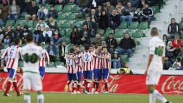 Los jugadores del Atl&eacute;tico celebran uno de los goles.