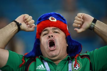 A Mexico fan cheers ahead of the 2017 Confederations Cup group A football match between Mexico and New Zealand at the Fisht Stadium in Sochi on June 21, 2017. / AFP PHOTO / FRANCK FIFE