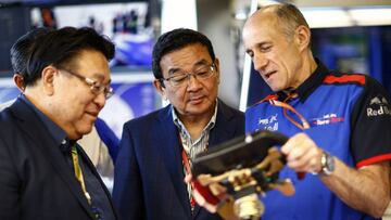MELBOURNE, AUSTRALIA - MARCH 25: Mr Seiji Kuraishi, Executive Vice President of Honda Motor Company with Mr Takahiro Hachigo, President Of Honda Motor Company chat with Franz Tost of Scuderia Toro Rosso and Austria during the Australian Formula One Grand Prix at Albert Park on March 25, 2018 in Melbourne, Australia. (Photo by Peter Fox/Getty Images)