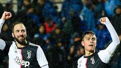 Juventus&#039; Argentine forward Paulo Dybala (R) celebrates with Juventus&#039; Argentinian forward Gonzalo Higuain after scoring his team&#039;s third goal during the Italian Serie A football match Atalanta Bergamo vs Juventus on November 23, 2019 at th