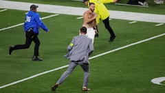 The man was indeed wearing jeans as he ran onto the field at Allegiant Stadium, Las Vegas.