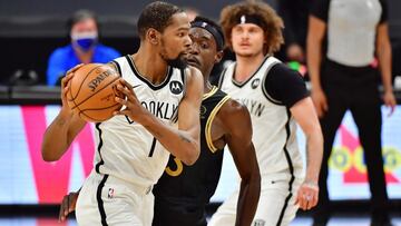 Nets clinch play-off berth as Doncic dominates Warriors
