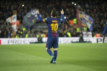 Messi celebrates after scoring.