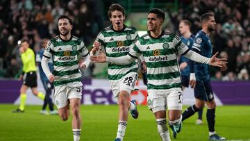 Celtic's Honduras striker #07 Luis Palma (L) celebrates after scoring his team first goal during the UEFA Champions League group E football match between Celtic and Feyenoord at Celtic Park stadium in Glasgow on December 13, 2023. (Photo by ANDY BUCHANAN / AFP)