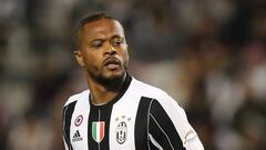 Patrice Evra running during the Italian Super Cup final match between AC Milan and Juventus in Doha.