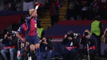 Barcelona's Spanish forward #19 Lamine Yamal celebrates scoring his team's first goal during the UEFA Champions League semi final first leg football match between FC Barcelona and Inter Milan at the Estadi Olimpic Lluis Companys in Barcelona on April 30, 2025. (Photo by LLUIS GENE / AFP)