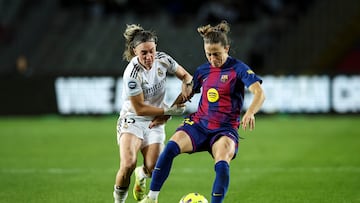 Bella Anderson of Real Madrid controls the ball while being defended by Irune Dorado of Real Madrid during the Liga F Moeve match between FC Barcelona Femeni and Real Madrid Femenino at Estadi Olimpic Lluis Companys in Barcelona, Spain, on November 15, 2025. (Photo by Gongora/NurPhoto via Getty Images)