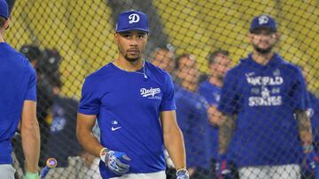 Oct 24, 2024; Los Angeles, CA, USA; Los Angeles Dodgers right fielder Mookie Betts (50) during the team workout prior to game one of the World Series against the New York Yankees at Dodger Stadium. Mandatory Credit: Jayne Kamin-Oncea-Imagn Images
