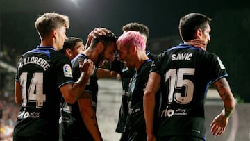 Los jugadores del Atlético celebran el 0-2 de Hermoso.