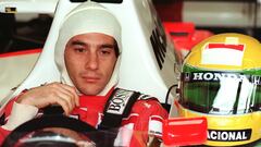 (FILES) This photo taken on July 26, 1991, in Hockenheim, shows the Brasilian driver from the McLaren team, Ayrton Senna, preparing before the first practice session at the Formula 1 Grand Prix event in Germany. Japanese automaker Honda said May 16, 2013, it will return to Formula One in 2015 as an engine supplier to British team McLaren in a bid to revive their championship-winning partnership. AFP PHOTO / ERIC FEFERBERG