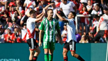 River Plate's Bruno Zuculini (L) and Marcelo Herrera (R) celebrates the team's secong goal against Spain's Real Betis during a friendly football match at the Malvinas Argentinas stadium in Mendoza, Argentina, on November 13, 2022. (Photo by Andres Larrovere / AFP) (Photo by ANDRES LARROVERE/AFP via Getty Images)