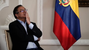 FILE - Colombian President Gustavo Petro waits to give a press conference on the 100th day of his administration at the Nariño Palace presidential office in Bogota, Colombia, Nov. 15, 2022. Petro presented on Tuesday, Feb. 7, 2023, his new development plan for the country.  (AP Photo/Ivan Valencia, File)