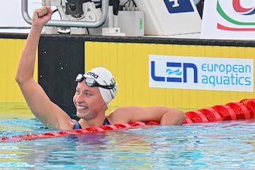 Hungary's Viktoria Mihalyvari-Farkas reacts after winning the Women's 400m individual medley final event on August 13, 2022 at the LEN European Aquatics Championships in Rome. (Photo by Alberto PIZZOLI / AFP)