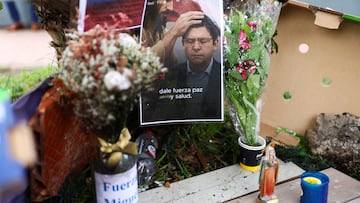 FILE PHOTO: A picture of Colombian Senator Miguel Uribe Turbay of the opposition Democratic Center party is seen at a tribute at a place where he was shot during a campaign event, in Bogota, Colombia, June 12, 2025. REUTERS/Luisa Gonzalez/File Photo