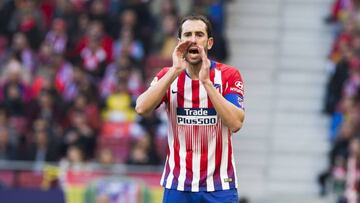 Godín, durante el Atlético-Getafe. Acabó lesionado, con una elongación muscular.
