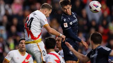 Rayo Vallecano's French defender #24 Florian Lejeune heads the ball during the Spanish league football match between Rayo Vallecano de Madrid and Real Sociedad at the Vallecas stadium in Madrid on October 29, 2023. (Photo by OSCAR DEL POZO / AFP)