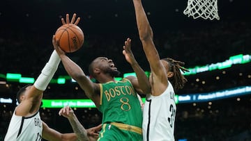 Nov 27, 2019; Boston, MA, USA; Boston Celtics guard Kemba Walker (8) shoots against Brooklyn Nets forward Nicolas Claxton (33) in the second quarter at TD Garden. Mandatory Credit: David Butler II-USA TODAY Sports
