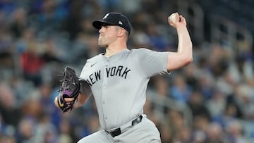 Apr 16, 2024; Toronto, Ontario, CAN; New York Yankees starting pitcher Carlos Rodon (55) pitches to the Toronto Blue Jays during the fourth inning at Rogers Centre. Mandatory Credit: John E. Sokolowski-USA TODAY Sports