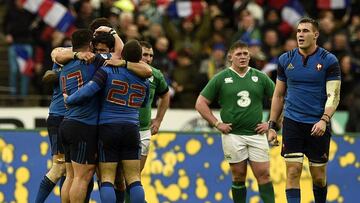 France&#039;s prop Rabah Slimani (L) and France&#039;s fly-half Jean Marc Doussain (3rd L) and  teammates celebrate after France defeated Ireland 10-9 in their Six Nations international rugby union match on February 13, 2016 at the Stade de France in Sain