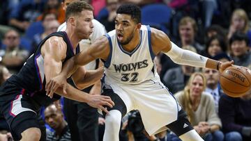Los Angeles Clippers forward Blake Griffin (32) defends Minnesota Timberwolves center Karl-Anthony Towns (32) in the second half of an NBA basketball game Saturday, Nov. 12, 2016, in Minneapolis. The Clippers won 119-105. (AP Photo/Bruce Kluckhohn)