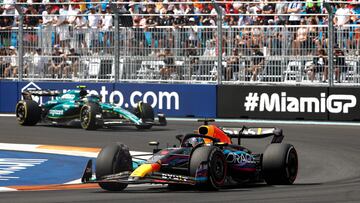 Max Verstappen of the Netherlands driving the (1) Oracle Red Bull Racing RB19 leads Fernando Alonso of Spain driving the (14) Aston Martin AMR23 Mercedes during the F1 Grand Prix of Miami at Miami International Autodrome