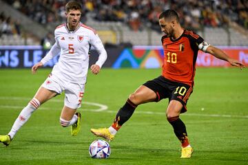 Welshman Chris Mepham tries to contain Belgium's Eden Hazard.