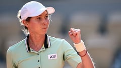 Spain's Cristina Bucsa reacts after a point to Poland's Iga Swiatek during their women's singles match on day three of the Roland-Garros Open tennis tournament at the Court Philippe-Chatrier in Paris on May 30, 2023. (Photo by Anne-Christine POUJOULAT / AFP)