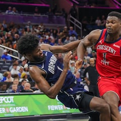 How much does Zion Williamson weight and how high can he jump?