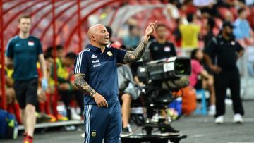 Argentina's football team coach Jorge Sampaoli reacts during the international friendly football match between Argentina and Singapore at the National Stadium in Singapore on June 13, 2017. / AFP PHOTO / ROSLAN RAHMAN