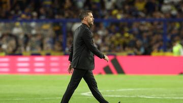 Boca Juniors' coach Fernando Gago walks on the field at half time during the Argentine Professional Football League Tournament 2024 'Cesar Luis Menotti' match between Boca Juniors and Deportivo Riestra at the Alberto Jose Armando 'La Bombonera' Stadium in Buenos Aires on October 27, 2024. (Photo by ALEJANDRO PAGNI / AFP)