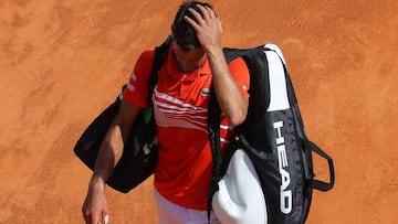Serbia's Novak Djokovic gestures as he leaves after losing the quarter final tennis match against Russia's Daniil Medvedev on the day 7 of the Monte-Carlo ATP Masters Series tournament on April 19, 2019 in Monaco. (Photo by VALERY HACHE / AFP)