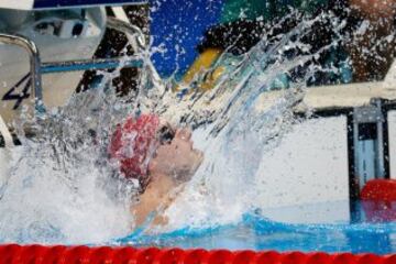 Chris Walker-Hebborn of Great Britain jumps into the water prior to the start of the Men's 4 x 100m Medley Relay Final on Day 8 of the Rio 2016 Olympic Games at the Olympic Aquatics Stadium on August 13, 2016 in Rio de Janeiro, Brazil.  (Photo by Adam Pre