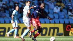 VIGO, SPAIN - AUGUST 15: Geoffrey Kondogbia of Atletico de Madrid battles for possession with Denis Suarez of Celta de Vigo during the LaLiga Santander match between RC Celta de Vigo and Club Atletico de Madrid at Abanca-Bala&iacute;dos on August 15, 2021