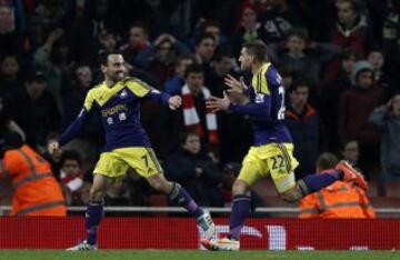 Leon Britton y Mathieu Flamini.