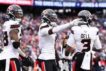 Oct 13, 2024; Foxborough, Massachusetts, USA; Houston Texans wide receiver Stefon Diggs (1) celebrates after scoring a touchdown against the New England Patriots during the second half at Gillette Stadium. Mandatory Credit: Brian Fluharty-Imagn Images