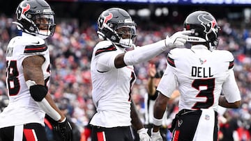 Oct 13, 2024; Foxborough, Massachusetts, USA; Houston Texans wide receiver Stefon Diggs (1) celebrates after scoring a touchdown against the New England Patriots during the second half at Gillette Stadium. Mandatory Credit: Brian Fluharty-Imagn Images