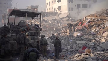 Israeli soldiers operate in a location given as Gaza, amid the ongoing conflict between Israel and the Palestinian Islamist group Hamas, in this screengrab from a handout video released on January 4, 2024. Israel Defense Forces/Handout via REUTERS THIS IMAGE HAS BEEN SUPPLIED BY A THIRD PARTY . REUTERS WAS UNABLE TO CONFIRM THE LOCATION OR DATE THE VIDEOS WERE TAKEN