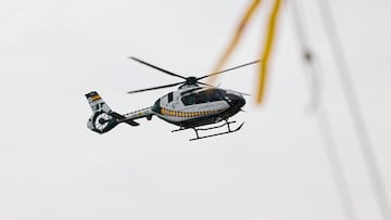 A financial fantasy rained down on a street in Detroit last Friday, as dollar bills were thrown from a helicopter over Gratiot Avenue.